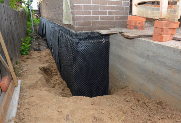 Happy homeowners after waterproofing job in Sturgeon Bay